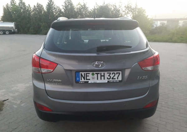 Hyundai Tucson cena 38500 przebieg: 155475, rok produkcji 2012 z Mrągowo małe 301